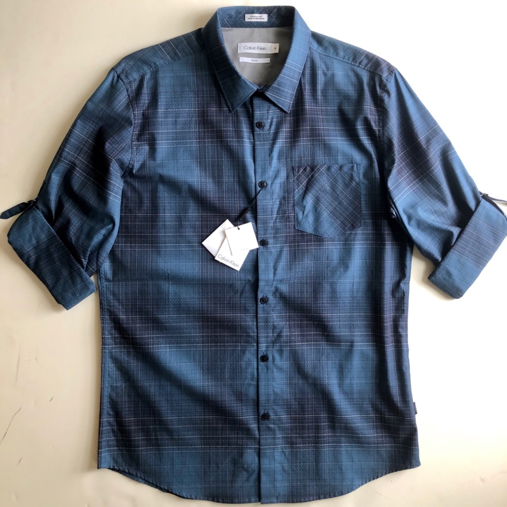 Calvin Klein Men’s Button up slim fit size M with roll up tabs. Not NWT.